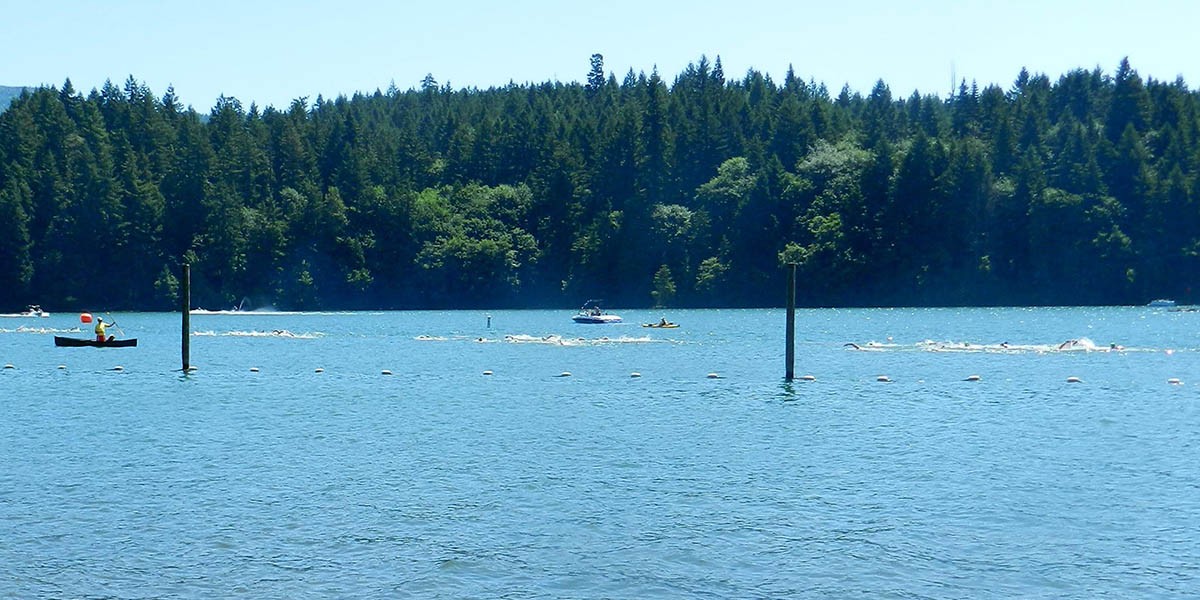 Swimmer waves on the first loop of the course.